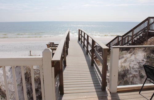Chivas Bluff Apartment | Located directly on a private beach