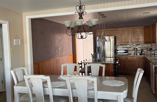 North Carolina Coast House | Located directly on canal w/beautiful water front views — one block from beach