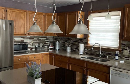 North Carolina Coast House | Located directly on canal w/beautiful water front views — one block from beach