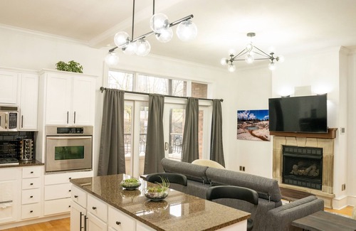 Fayetteville Condo | Located within the heart of the entertainment district! ADA ramp/parking on site