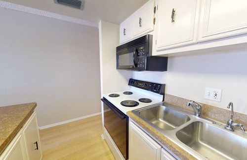 Sunset Beach Condo | Location, Location. Charming Beachside Condo. Pool, Deck Overlooking the Bay.