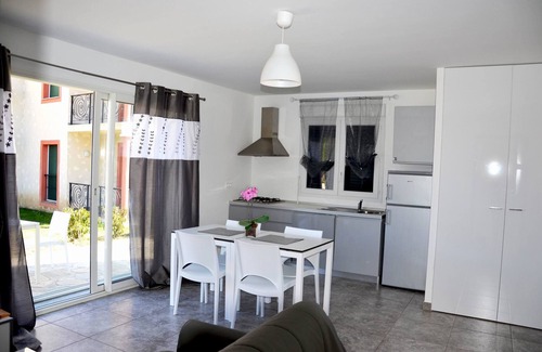 Santa-Lucia-di-Moriani Apartment | Lodging on the beach,100 mt away,A/C, pool, restaurant,children play ground