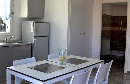 Santa-Lucia-di-Moriani Apartment | Lodging on the beach,100 mt away,A/C, pool, restaurant,children play ground