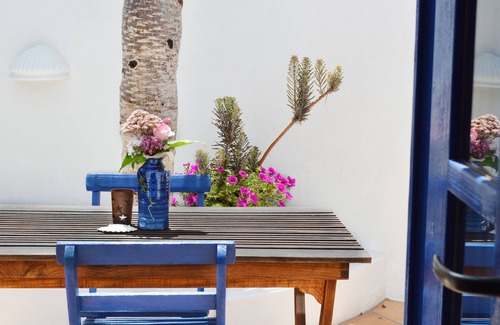 Uga Apartment | Loft-style studio with private, secluded outdoor area in historic finca
