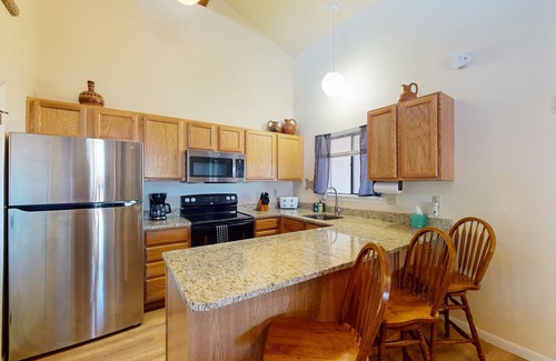 Pagosa Springs Condo | Lofty condo with patio - walk to golf, recreation center & eateries