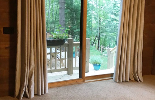 Stone Lake Cabin | Log cabin on 19 mile Long Lake, large screen porch + dock, 1 acre mature pines
