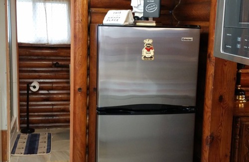 Millersport Cabin | Log Cabin Waterfront getaway at Buckeye Lake featured in the 2019 Tour of Homes