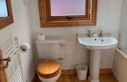 Louth Cabin | Log cabin with veranda, nestled in Kenwick Park, Louth