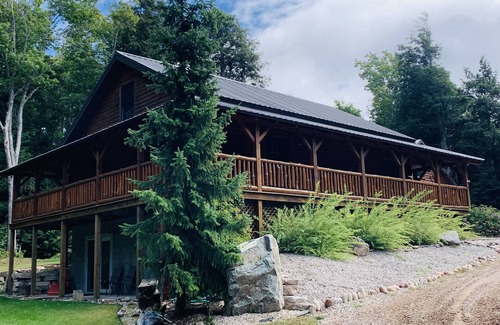 Newberry House | Log Home Located on Lake Muskallonge