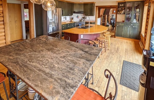 Shawnigan Lake House | Log Home on 5 Acres sleeps 10 comfortably three bedrooms plus more sleep areas.