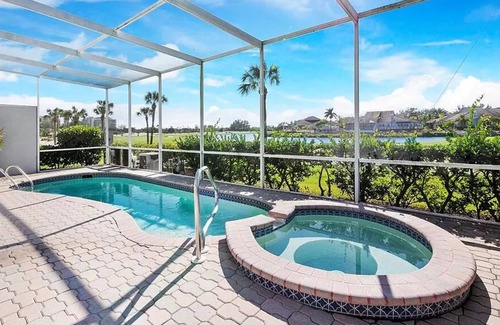Bay Isles Villa | Longboat Key Oasis, golf course water views, pool, hottub