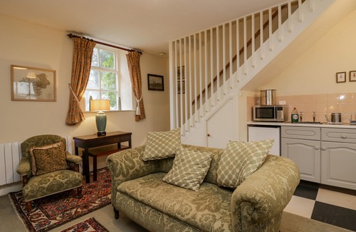 Grange-over-Sands Cottage | LONGLANDS GROOM'S QUARTERS, pet friendly, with a garden in Cartmel
