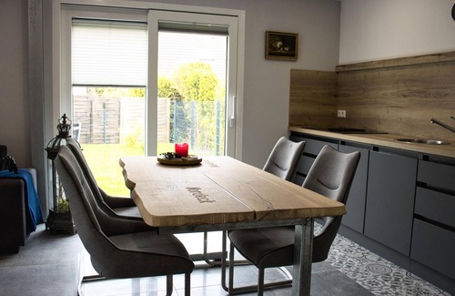 Berumbur House | Look forward to relaxing on approx. 54 square meters of living space in the Berumbur vacation park near the North Sea coast. Our facilities: fenced property (ideal for dog owners), parking space, garage for bicycles/e-bikes, underfloor heating.