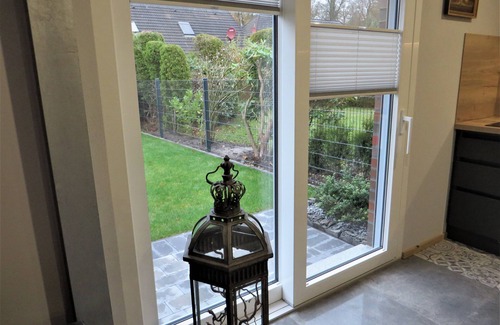 Berumbur House | Look forward to relaxing on approx. 54 square meters of living space in the Berumbur vacation park near the North Sea coast. Our facilities: fenced property (ideal for dog owners), parking space, garage for bicycles/e-bikes, underfloor heating.