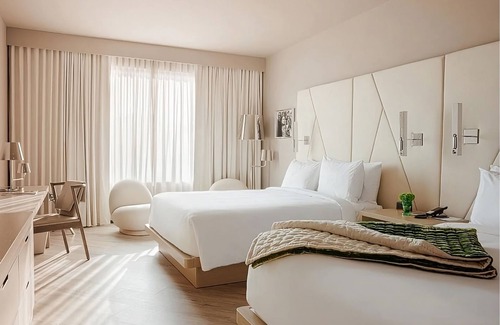 Florida Central Atlantic Coast Hotel | Look No Further! 2 Exquisite Units, w/Outdoor Pool, Shuttle Service, Parking!
