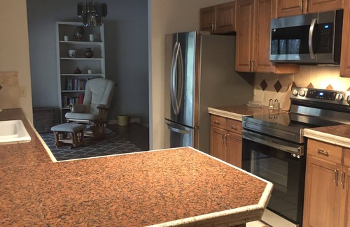Palm City House | Looking for a short-term housing option within sought-after Palm City Schools?