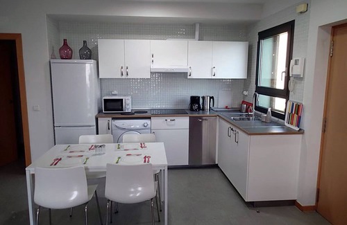 El Medano Apartment | Los Balos 29 by RENTMEDANO beach front attic wifi, parking, board storage