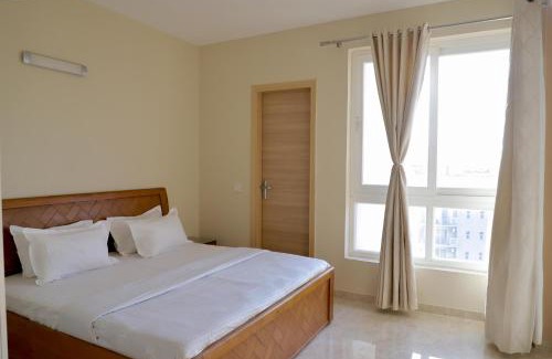 Vrindavan Apartment | Lotus Serenity by Red OliveACWiFiVrindavan