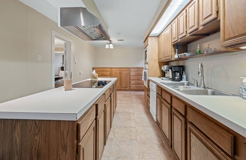 Church Point House | Lou Wilda House is a charming 3 bedroom home with a cozy back patio.