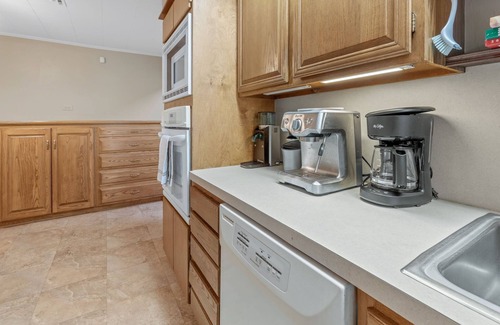 Church Point House | Lou Wilda House is a charming 3 bedroom home with a cozy back patio.