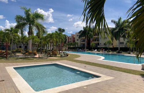 Gregorio Luperon Apartment | Lovely and cozy home with pool and GYM. Located near major Bars and Restaurants
