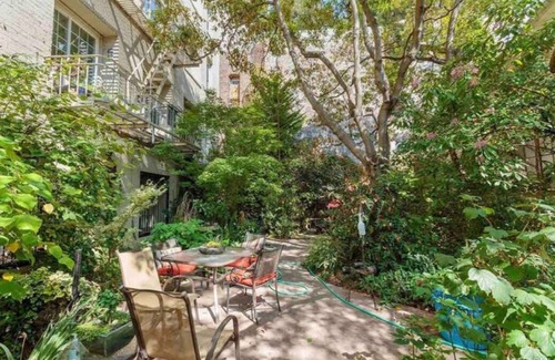 Theater District Apartment | Lovely! 1bdrm w/Secret Garden & Parking Garage