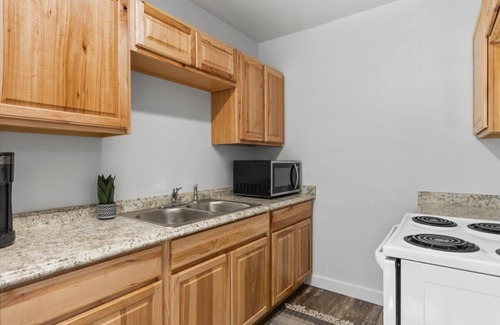 Central - Terry Apartment | Lovely 1BR Hideaway: Fully Furnished, Unit 216