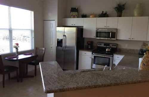 Estero Condo | Lovely 2-bedroom condo in Pelican Sound Golf and Country club , Estero Fl .