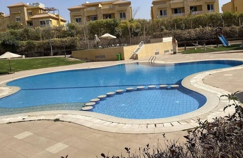 Sheikh Zayed City Apartment | Lovely 3-bedroom rental unit with pool in sheihk Zayed city