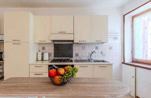 Claino Con Osteno Apartment | Lovely apartment for 4 guests with WIFI, TV, pets allowed and parking