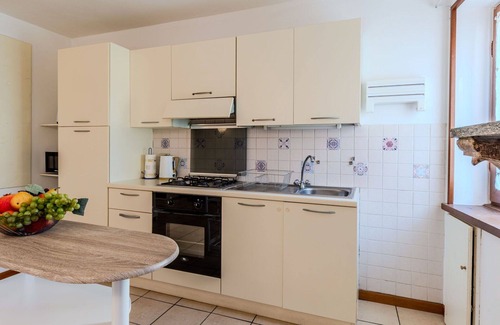 Claino Con Osteno Apartment | Lovely apartment for 4 guests with WIFI, TV, pets allowed and parking