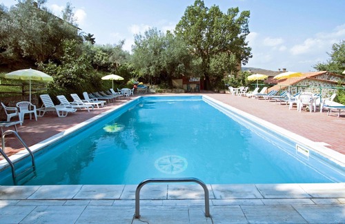 Paciano Apartment | Lovely apartment for 7 guests with WIFI, pool, TV, patio and pets allowed