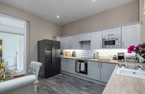 Rhyd-y-clafdy Apartment | Lovely apartment for 15 guests with WIFI, hot tub, terrace and pets allowed