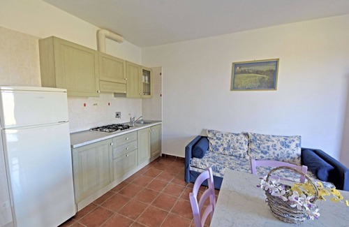 Follonica Apartment | Lovely apartment for 4 people with pool, A/C, TV, patio and pets allowed
