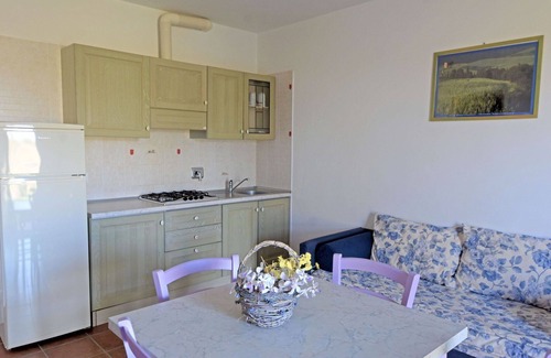 Follonica Apartment | Lovely apartment for 4 people with pool, A/C, TV, patio and pets allowed