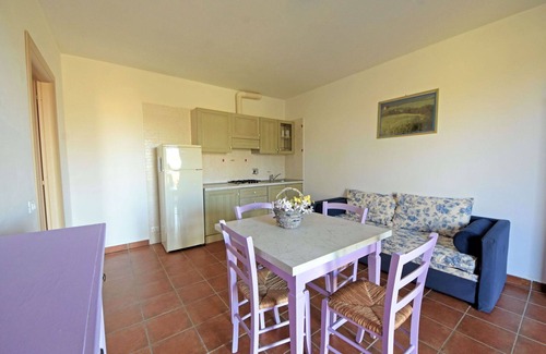 Follonica Apartment | Lovely apartment for 4 people with pool, A/C, TV, patio and pets allowed