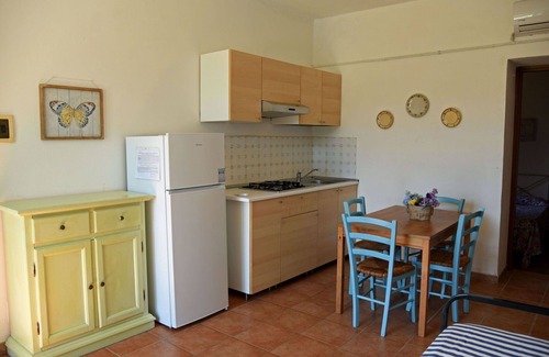 Follonica Apartment | Lovely apartment for 4 people with pool, A/C, TV, patio and pets allowed