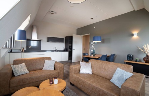 Colijnsplaat Apartment | Lovely apartment for 4 guests with hot tub, WIFI, TV and balcony