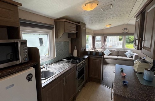 Newquay House | Lovely caravan with decking at Newquay Holiday Park, Cornwall, ref 93008H