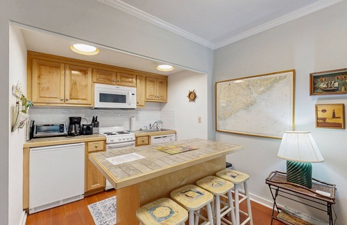 West Beach Village Apartment | Lovely condo with free WiFi & shared tennis courts - close to golf & beaches