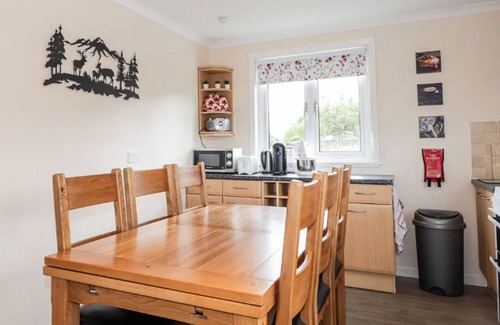 Drumchork House | Lovely cosy cottage with stunning loch and mountain views in scenic countryside