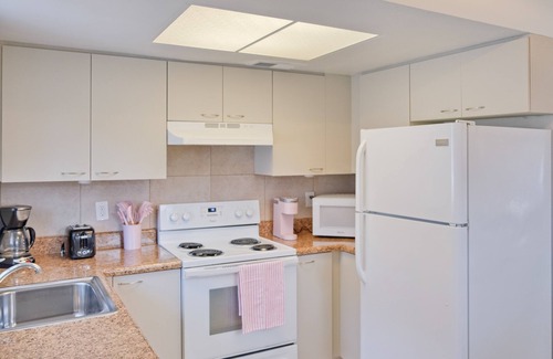 Naples Park House | Lovely dog-friendly duplex near Gulf with enclosed yard, central AC, & W/D
