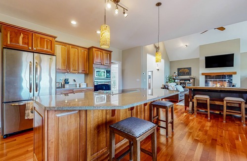 North Conway House | Lovely home with water view, hot tub, fireplace, & washer/dryer