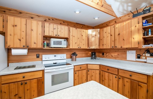 Eagle River House | Lovely lakefront gem with private dock, large deck, & free WiFi - dog-friendly