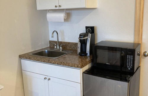 Colington Apartment | Lovely studio apartment with an indoor electric fire place