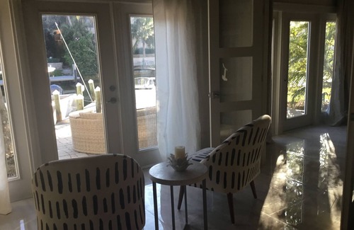 Royal Harbor Condo | Lovely Two bedroom/Two bath Main Floor on the canal to Naples Bay! Pet friendly