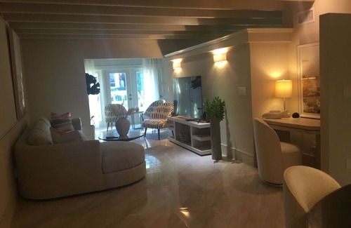 Royal Harbor Condo | Lovely Two bedroom/Two bath Main Floor on the canal to Naples Bay! Pet friendly