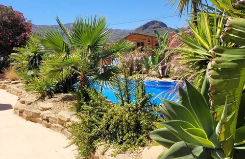 El Cortijo Grande Villa | Lovely villa with natural style swimming pool, fab outside area with great views