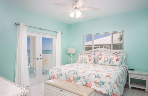 Breezeswept Beach Estates House | Low Key Sunrise: Waterfront pool home