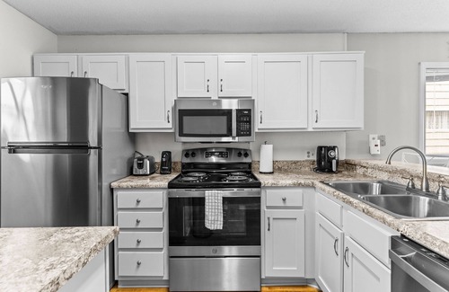 Holden Beach Condo | Lower Waterfront Condo with Oceanfront Balcony, Shared Outdoor Pool, WiFi & AC